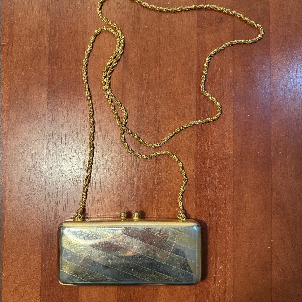 Elegant Gold and Silver Clutch Bag